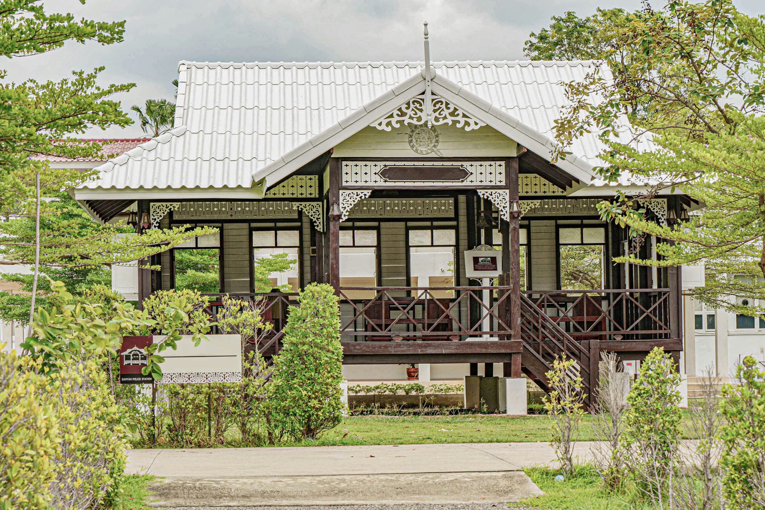 a house with a white roof and a porch